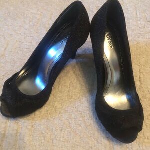 Open toed glitter black pump with twist front detail. 3 1/2” heel. Worn once.